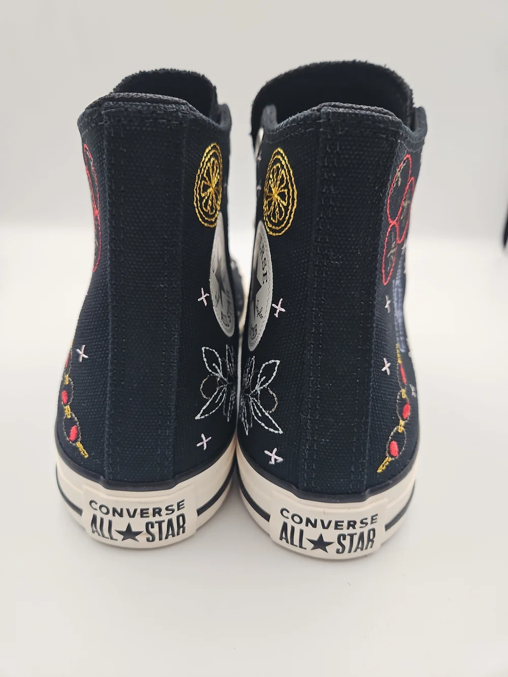 Converse Black High-Top Sneakers with Multicolor Embroidered Motifs